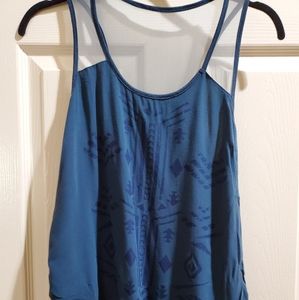 Junior teal top with sheer sleeveless tank
